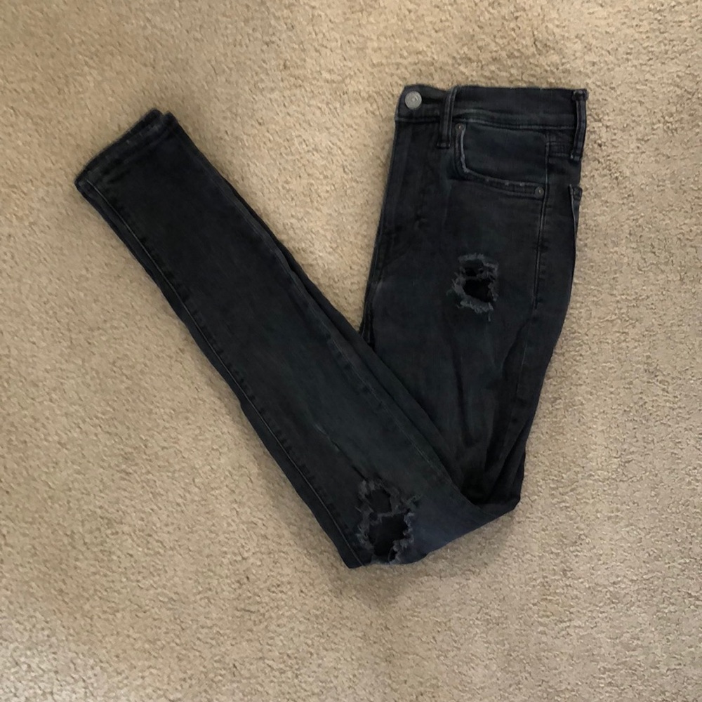 Dark grey/ black H&M skinny ripped jeans.